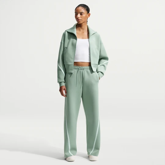 Zdjęcie produktu Spodnie damskie do tenisa ze średnim stanem Dri-FIT Nike Advantage - Zieleń