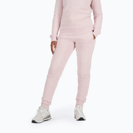 Zdjęcie produktu Spodnie damskie New Balance Classy Core stone pink