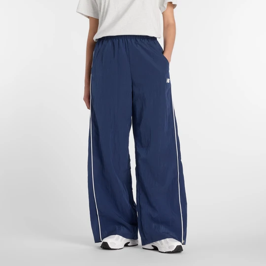 Zdjęcie produktu Spodnie damskie New Balance WB61Z1E6NNY – granatowe