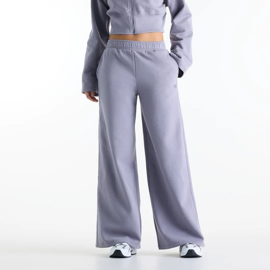 Zdjęcie produktu Spodnie damskie New Balance WB6220LWOFG – fioletowe