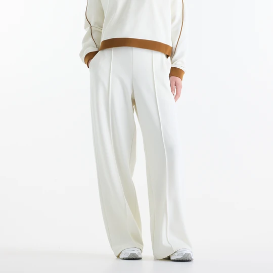 Zdjęcie produktu Spodnie damskie New Balance WB6233SEAGA – białe