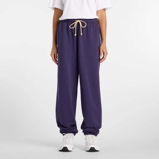 Zdjęcie produktu Spodnie damskie New Balance WP41513BOY – fioletowe