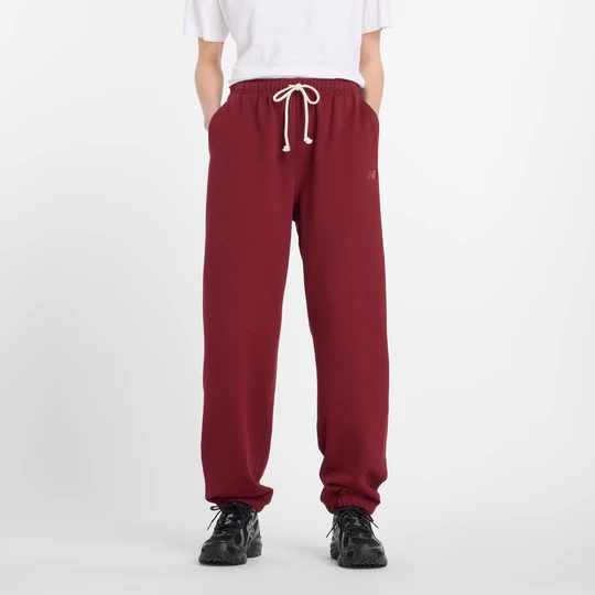 Zdjęcie produktu Spodnie damskie New Balance WP41513MHB – bordowe