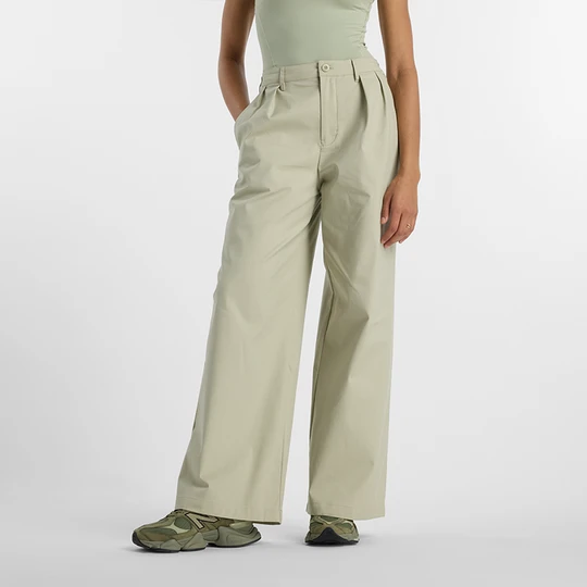 Zdjęcie produktu Spodnie damskie New Balance WP51538OVN – beżowe