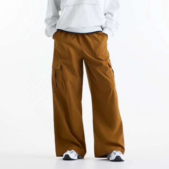 Zdjęcie produktu Spodnie damskie New Balance WP53504BFT – brązowe