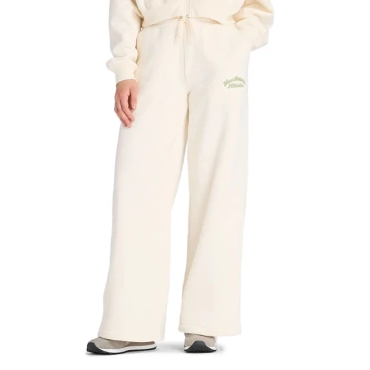 Zdjęcie produktu Spodnie damskie New Balance WP53902PEF - beżowe