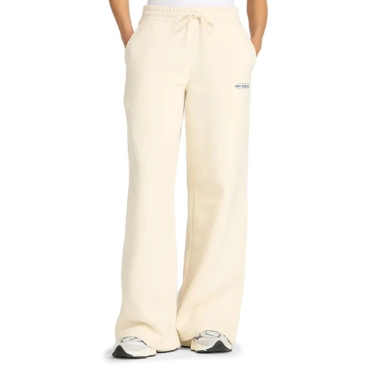 Zdjęcie produktu Spodnie damskie New Balance WP53903LIN - beżowe