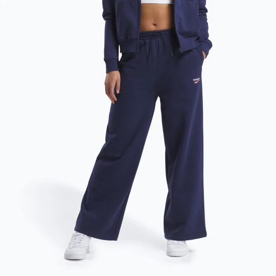 Zdjęcie produktu Spodnie damskie Reebok Identity Small Logo Fleece WIde Leg vector navy Granatowy