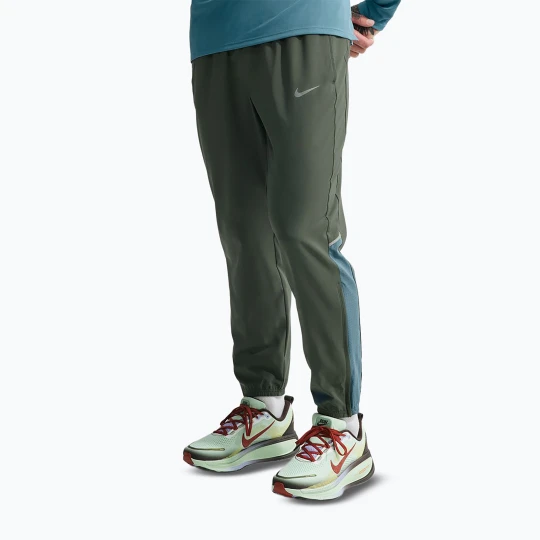 Zdjęcie produktu Spodnie do biegania męskie Nike Miler Dri-Fit Woven camo green / mineral slate