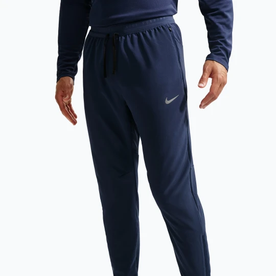 Zdjęcie produktu Spodnie do biegania męskie Nike Stride Dri-Fit Woven midnight navy Granatowy