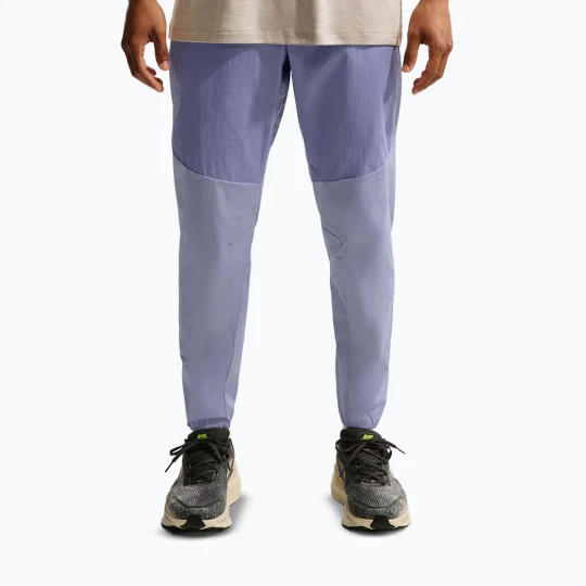 Zdjęcie produktu Spodnie do biegania męskie Nike Stride Repel Woven iron purple / indigo haze Fioletowy