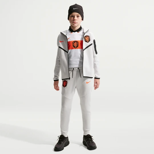 Zdjęcie produktu Spodnie do piłki nożnej dla dużych dzieci (chłopców) Nike Holandia Tech Fleece - Szary
