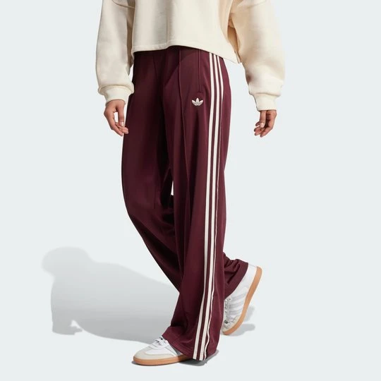 Zdjęcie produktu Spodnie dresowe Adicolor Classic Firebird Loose Adidas bordowy