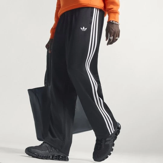 Zdjęcie produktu SPODNIE DRESOWE ADICOLOR LOOSE Adidas