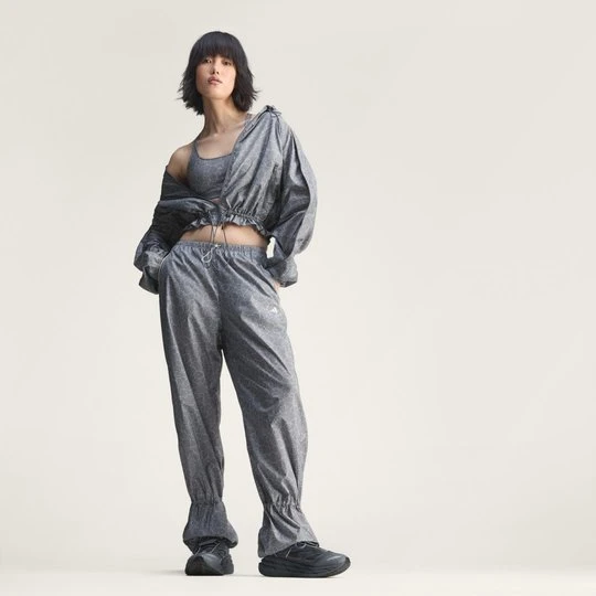 Zdjęcie produktu Spodnie dresowe adidas by Stella McCartney z nadrukiem
