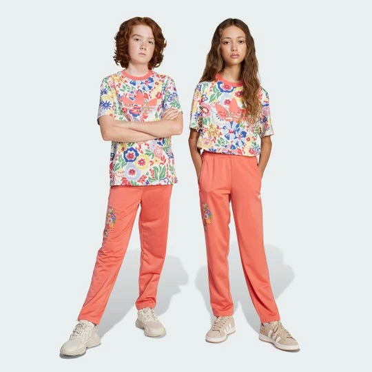 Zdjęcie produktu Spodnie dresowe adidas Originals x Liberty London Firebird Kids Preloved Scarlet