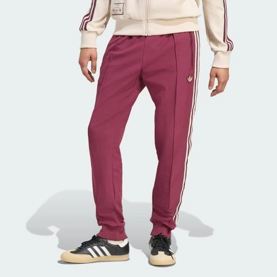 Zdjęcie produktu Spodnie dresowe Ajax Amsterdam Terrace Icons Adidas Victory Crimson