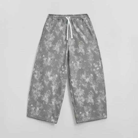 Zdjęcie produktu Spodnie dresowe baggy ze wzorem tie-dye House