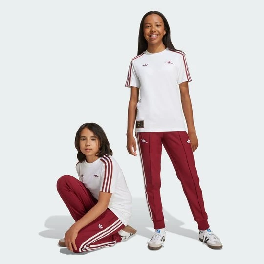 Zdjęcie produktu Spodnie dresowe dla dzieci Arsenal Terrace Icons Adidas Team Coll Burgundy 2
