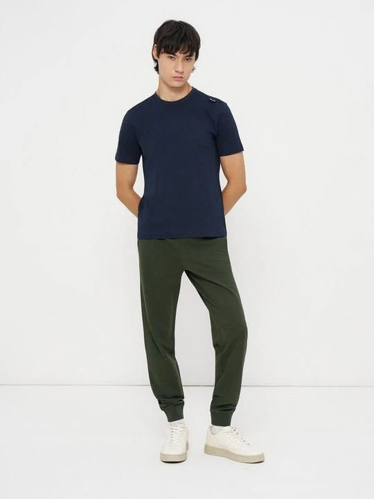 Zdjęcie produktu Spodnie dresowe EA7 Emporio Armani ciemnozielony