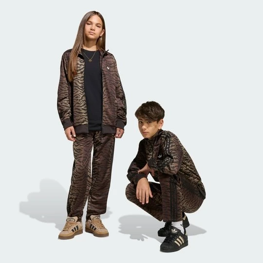 Zdjęcie produktu SPODNIE DRESOWE FIREBIRD AOP Adidas Night Brown