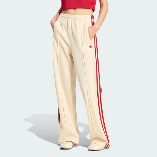 Zdjęcie produktu Spodnie dresowe Firebird Loose Adidas żółty