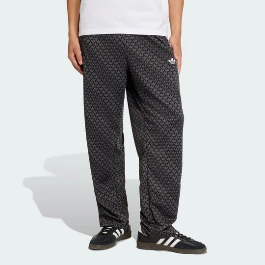 Zdjęcie produktu SPODNIE DRESOWE FIREBIRD LOOSE MONOGRAM Adidas czarny