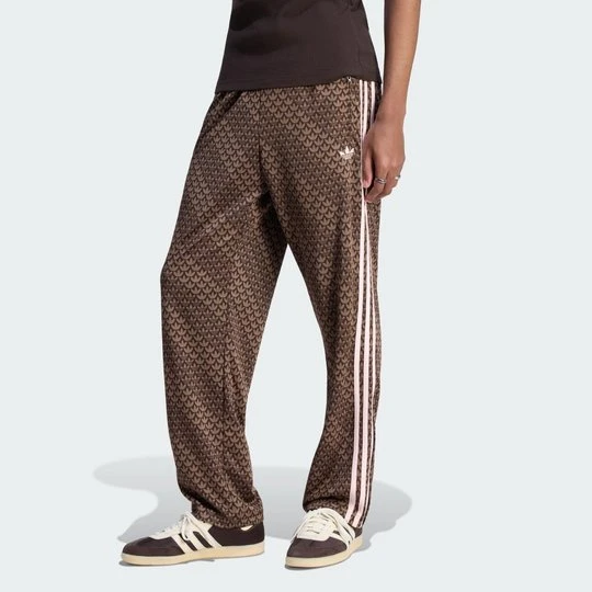 Zdjęcie produktu SPODNIE DRESOWE FIREBIRD LOOSE MONOGRAM Adidas brązowy