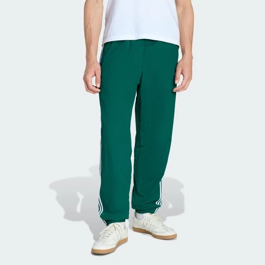 Zdjęcie produktu SPODNIE DRESOWE FIREBIRD WOVEN Adidas Collegiate Green
