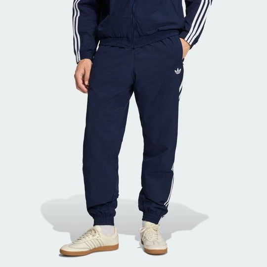 Zdjęcie produktu SPODNIE DRESOWE FIREBIRD WOVEN Adidas Night Indigo