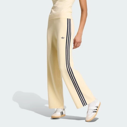 Zdjęcie produktu Spodnie dresowe Knit Firebird Adidas żółty