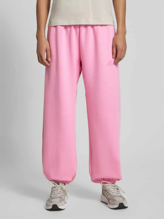Zdjęcie produktu Spodnie dresowe krój loose fit z dodatkiem bawełny Adidas Mocnoróżowy