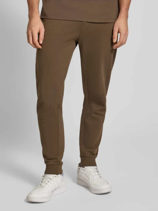 Zdjęcie produktu Spodnie dresowe o kroju comfort fit z czystej bawełny model ‘NAPIN’ Hugo Ciemnobrązowy