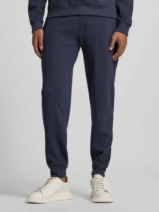 Zdjęcie produktu Spodnie dresowe o kroju regular fit z Mieszanka bawełny Model 'STRUCTURE PANTS' Boss Ciemnoniebieski
