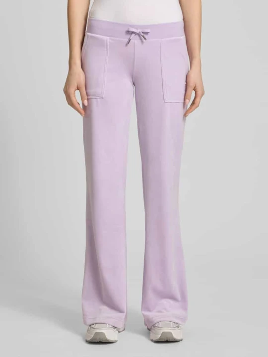 Zdjęcie produktu Spodnie dresowe o kroju niski stan z wpuszczanymi kieszeniami model 'LAYLA' Juicy Couture Jasnofioletowy
