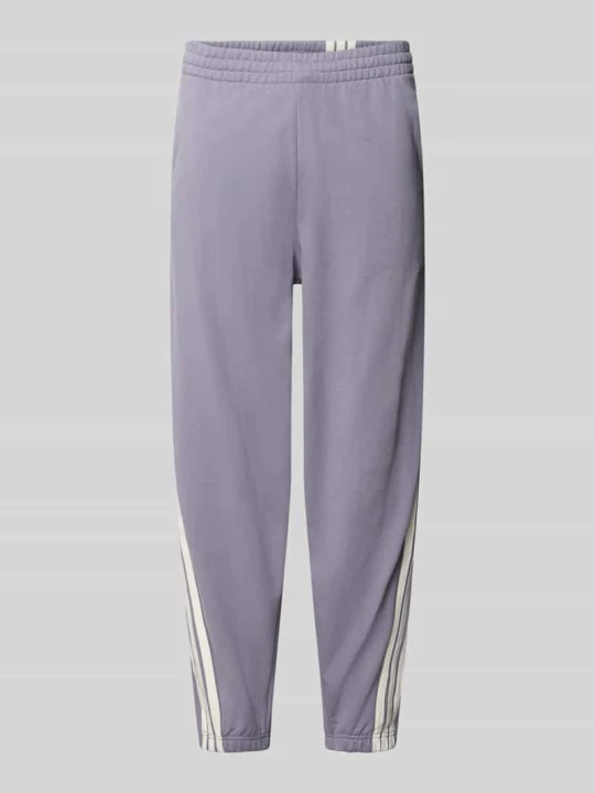 Zdjęcie produktu Spodnie dresowe o kroju regular fit z czystej bawełny Adidas Fioletowy