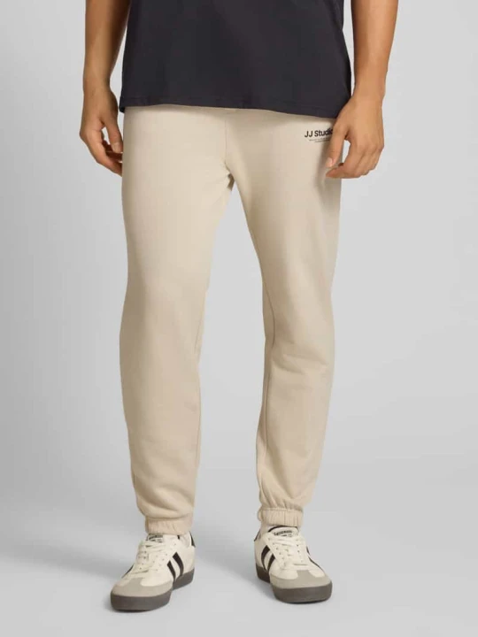 Zdjęcie produktu Spodnie dresowe w kroju regular fit z elastycznym pasem model 'KANE' Jack&Jones Beżowy