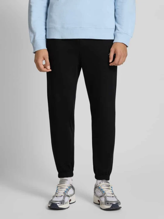 Zdjęcie produktu Spodnie dresowe w kroju regular fit z elastycznym pasem model 'KANE' Jack&Jones czarny