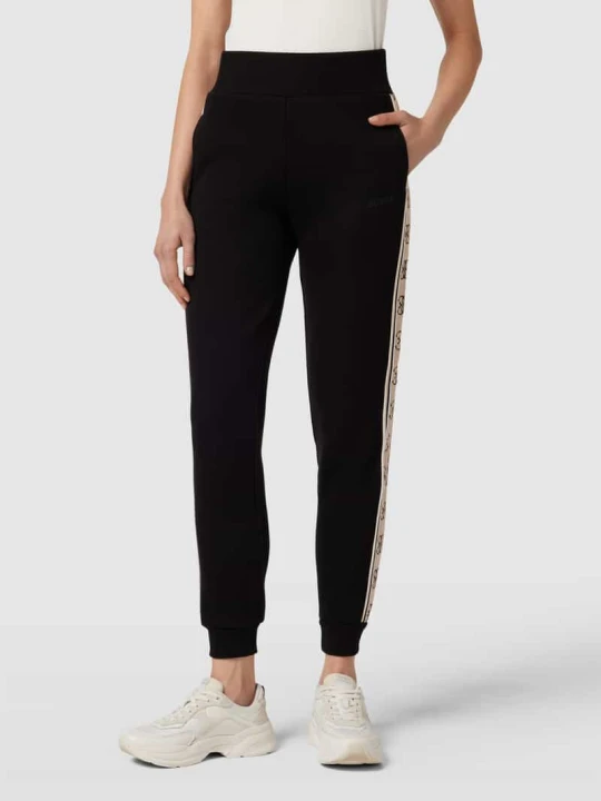 Zdjęcie produktu Spodnie dresowe o kroju regular fit z lampasami model ‘BRITNEY’ Guess Czarny