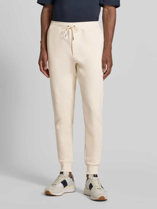 Zdjęcie produktu Spodnie dresowe o kroju regular fit z mieszanka bawełny Polo Ralph Lauren Piaskowy