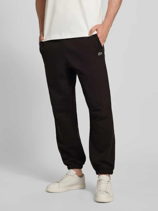 Zdjęcie produktu Spodnie dresowe o kroju regular fit z mieszanki bawełny Lacoste Ciemnobrązowy