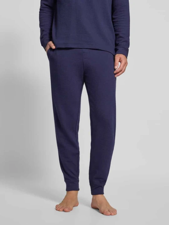 Zdjęcie produktu Spodnie dresowe o kroju regular fit z mieszanki bawełny model ‘AUSTIN PANTS’ Hugo Granatowy