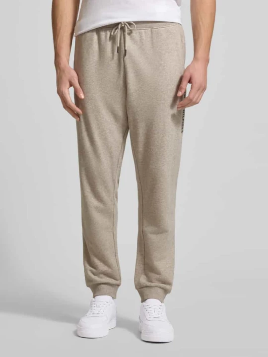 Zdjęcie produktu Spodnie dresowe o kroju regular fit z mieszanki bawełny Tommy Hilfiger Złamany biały melanż