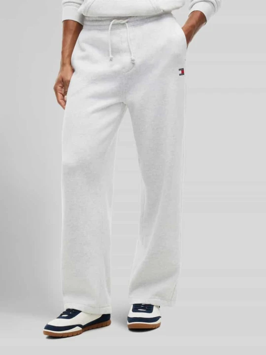 Zdjęcie produktu Spodnie dresowe o kroju regular fit z mieszanki bawełny Tommy Jeans Jasnoszary melanż