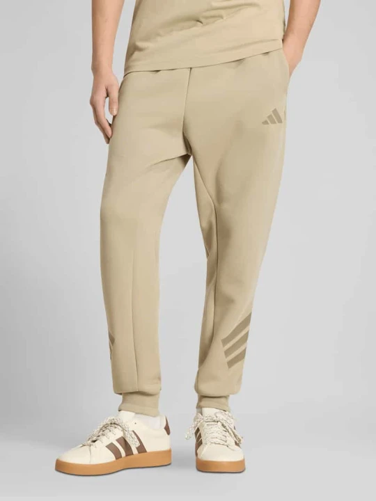 Zdjęcie produktu Spodnie dresowe o kroju regular fit z tunelem Adidas Oliwkowy
