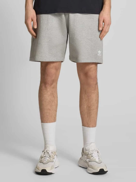 Zdjęcie produktu Spodnie dresowe o kroju regular fit z wyhaftowanym logo adidas Originals Średnioszary melanż
