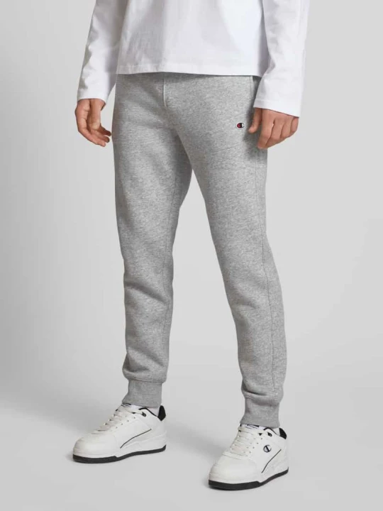 Zdjęcie produktu Spodnie dresowe o kroju regular fit z wyhaftowanym logo Champion Średnioszary melanż