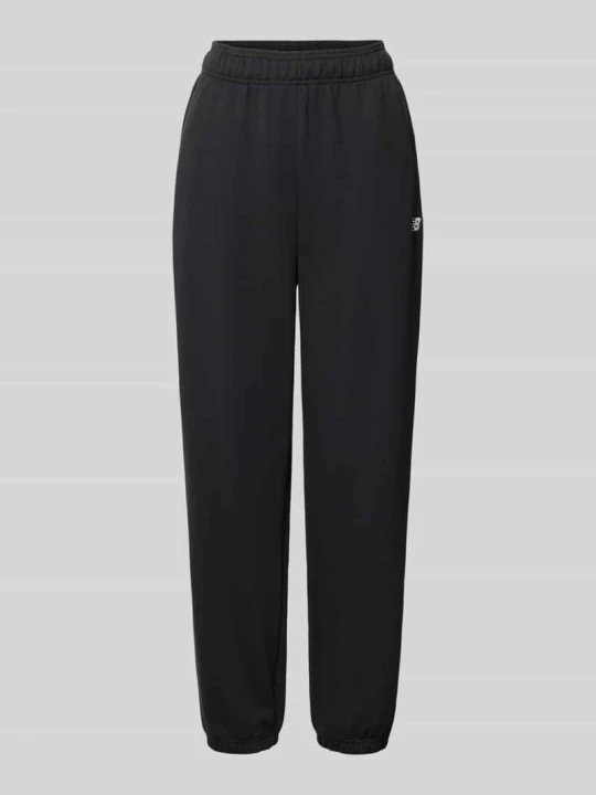 Zdjęcie produktu Spodnie dresowe o kroju regular fit z wyhaftowanym logo New Balance Czarny