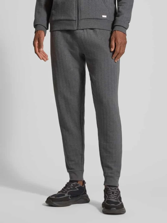 Zdjęcie produktu Spodnie dresowe o kroju relaxed fit z mieszanki bawełny model ‘HERITAGE’ Boss Antracytowy