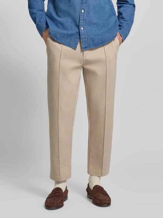 Zdjęcie produktu Spodnie dresowe o kroju relaxed fit z mieszanki bawełny model 'SE_TWIST' Boss Piaskowy